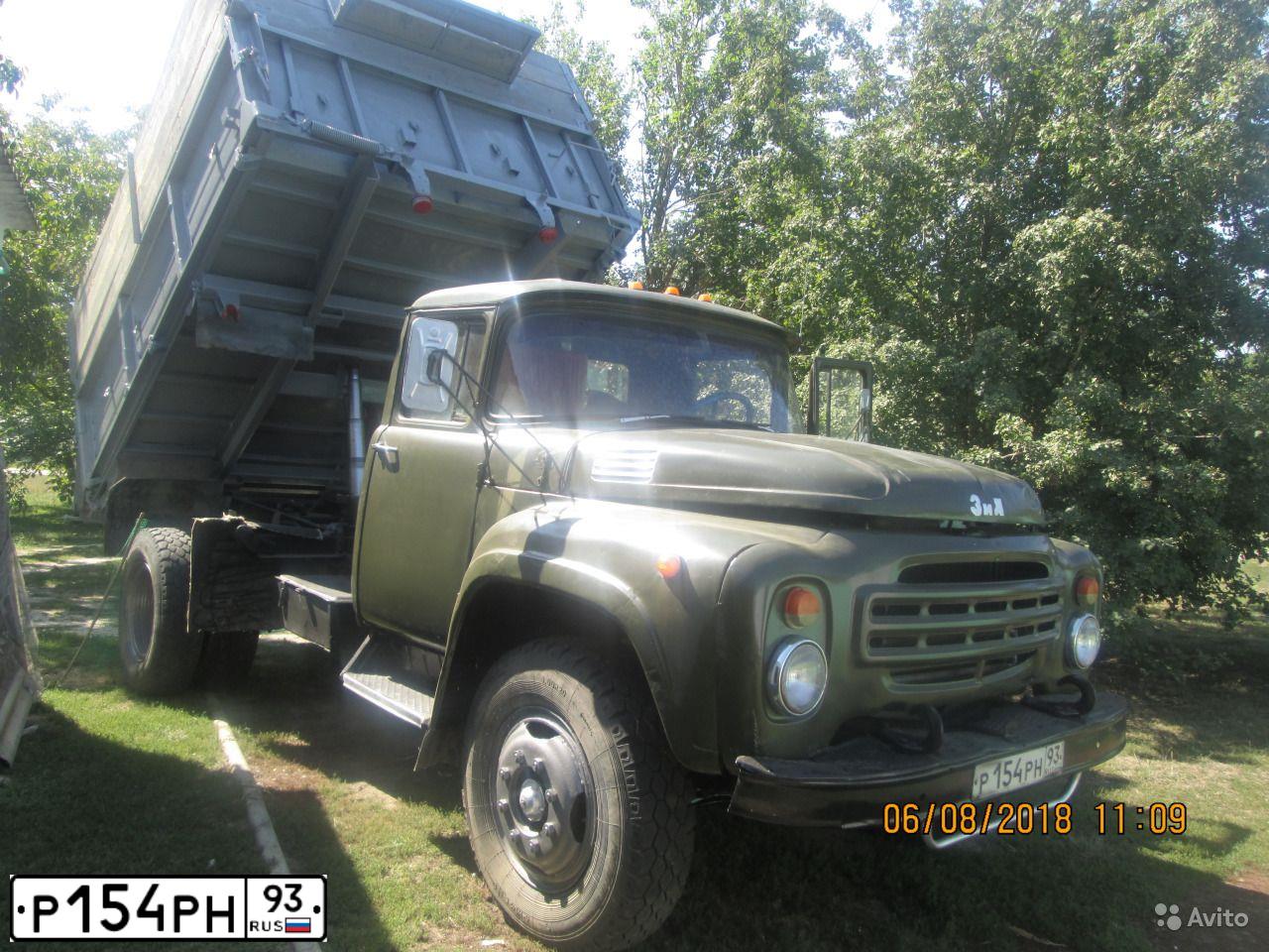 Фото автомобиля ZIL MMZ 554 /6X4/, 1991 — госномер Р154РН93. Цвет: Хаки
