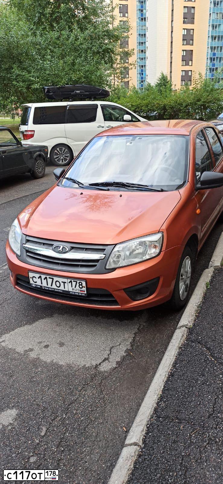 Фото автомобиля LADA 2191 GRANTA, 2015 — госномер А710УО147. Цвет: Оранжевый