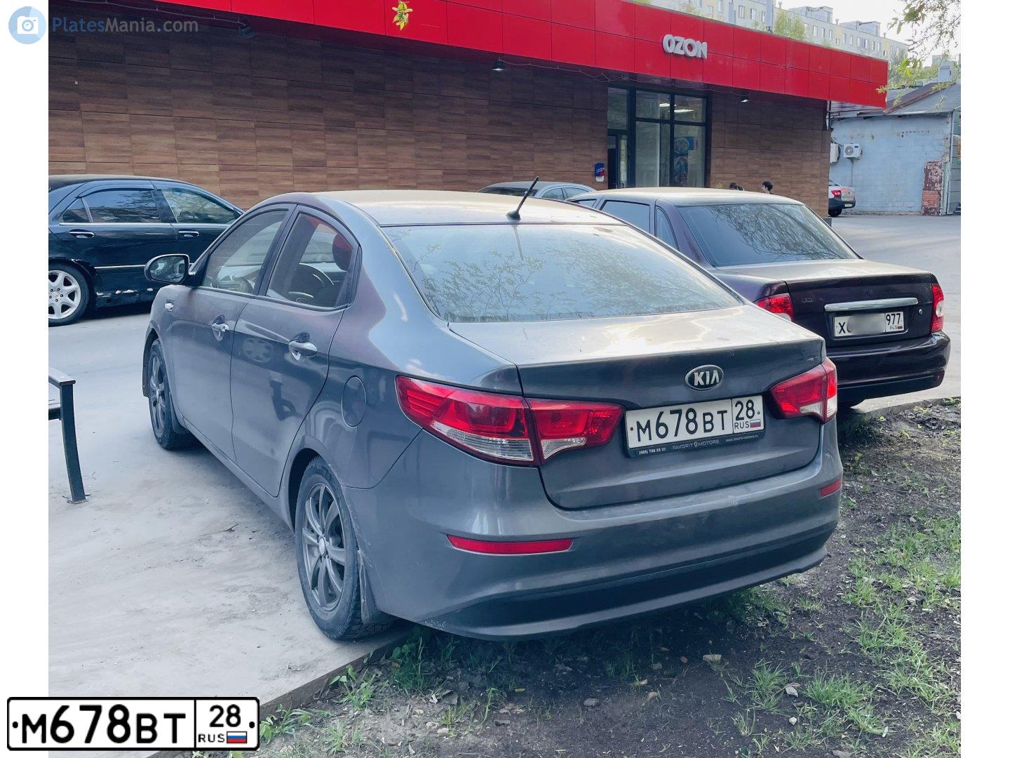 Фото автомобиля KIA RIO, 2015 — госномер М678ВТ28. Цвет: СЕРЫЙ ТЕМНЫЙ