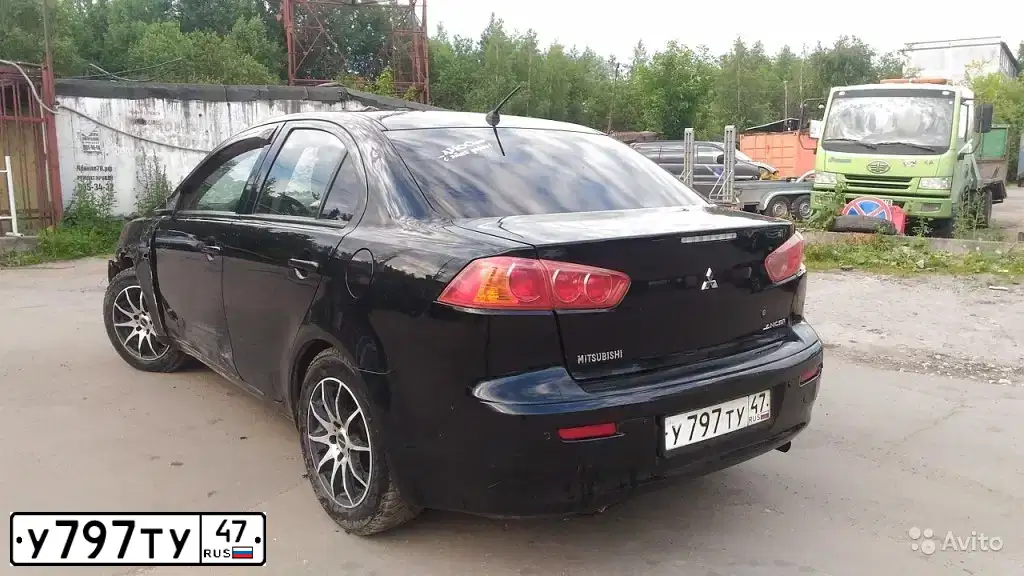 Фото автомобиля MITSUBISHI LANCER, 2008 — госномер У797ТУ47. Цвет: ЧЕРНЫЙ