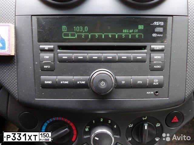 Фото автомобиля CHEVROLET AVEO, 2009 — госномер Р331ХТ150. Цвет: ЖЕЛТЫЙ