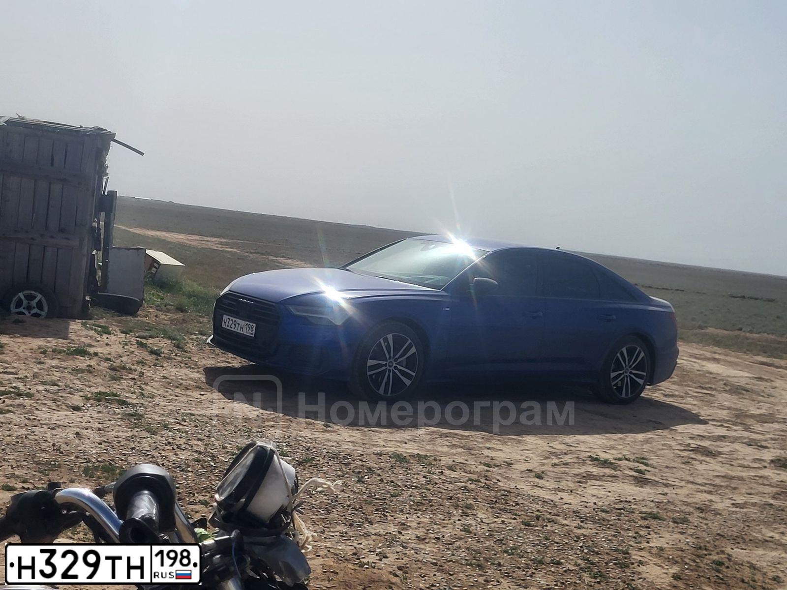 Фото автомобиля AUDI A6, 2022 — госномер Н329ТН198. Цвет: синий