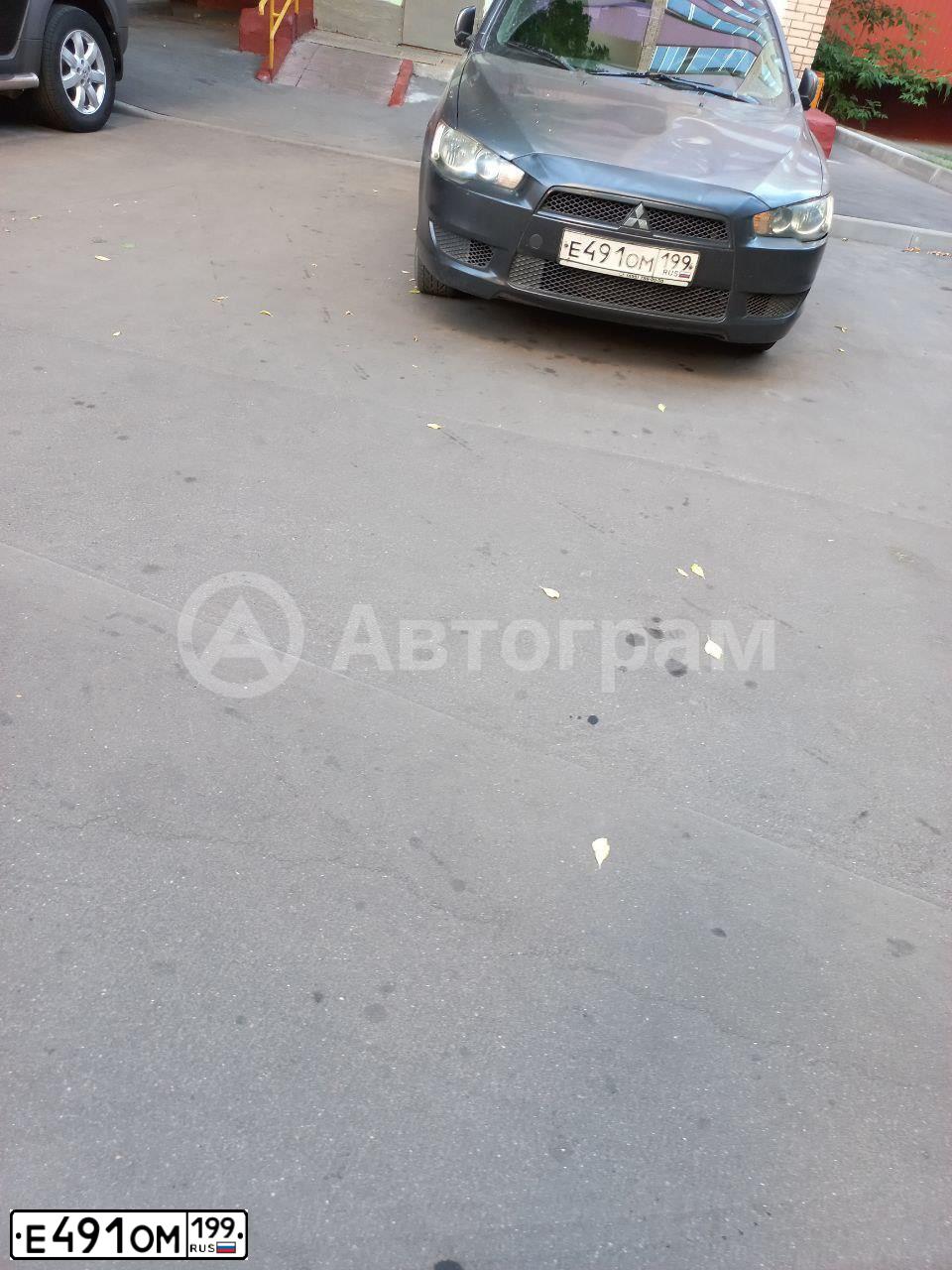 Фото автомобиля MITSUBISHI LANCER, 2008 — госномер М302СТ67. Цвет: Серый