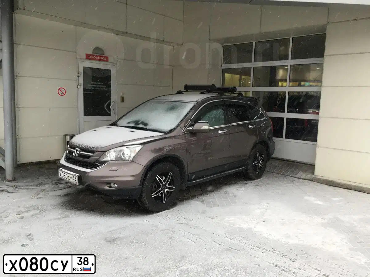 Фото автомобиля HONDA CR-V, 2011 — госномер Х080СУ38. Цвет: СЕРО-КОРИЧНЕВЫЙ