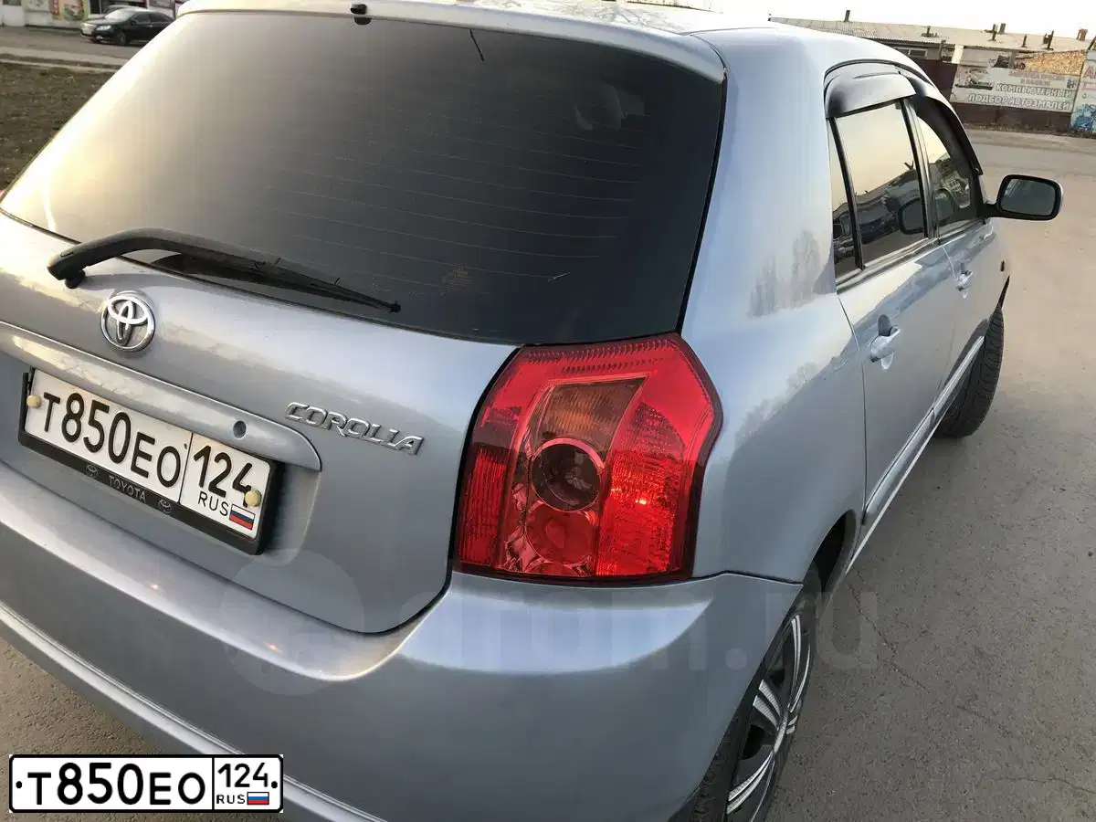 Фото автомобиля TOYOTA COROLLA, 2006 — госномер С058ВС138. Цвет: голубой