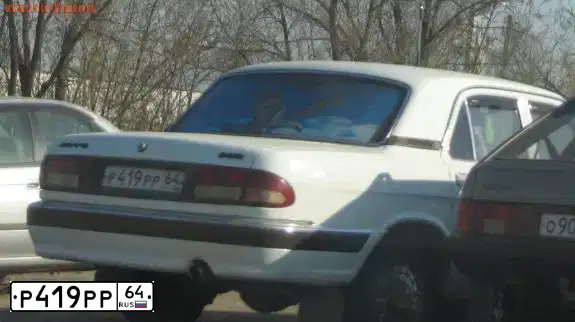 Фото автомобиля ГАЗ 3110, 2000 — госномер Р419РР64. Цвет: Белый