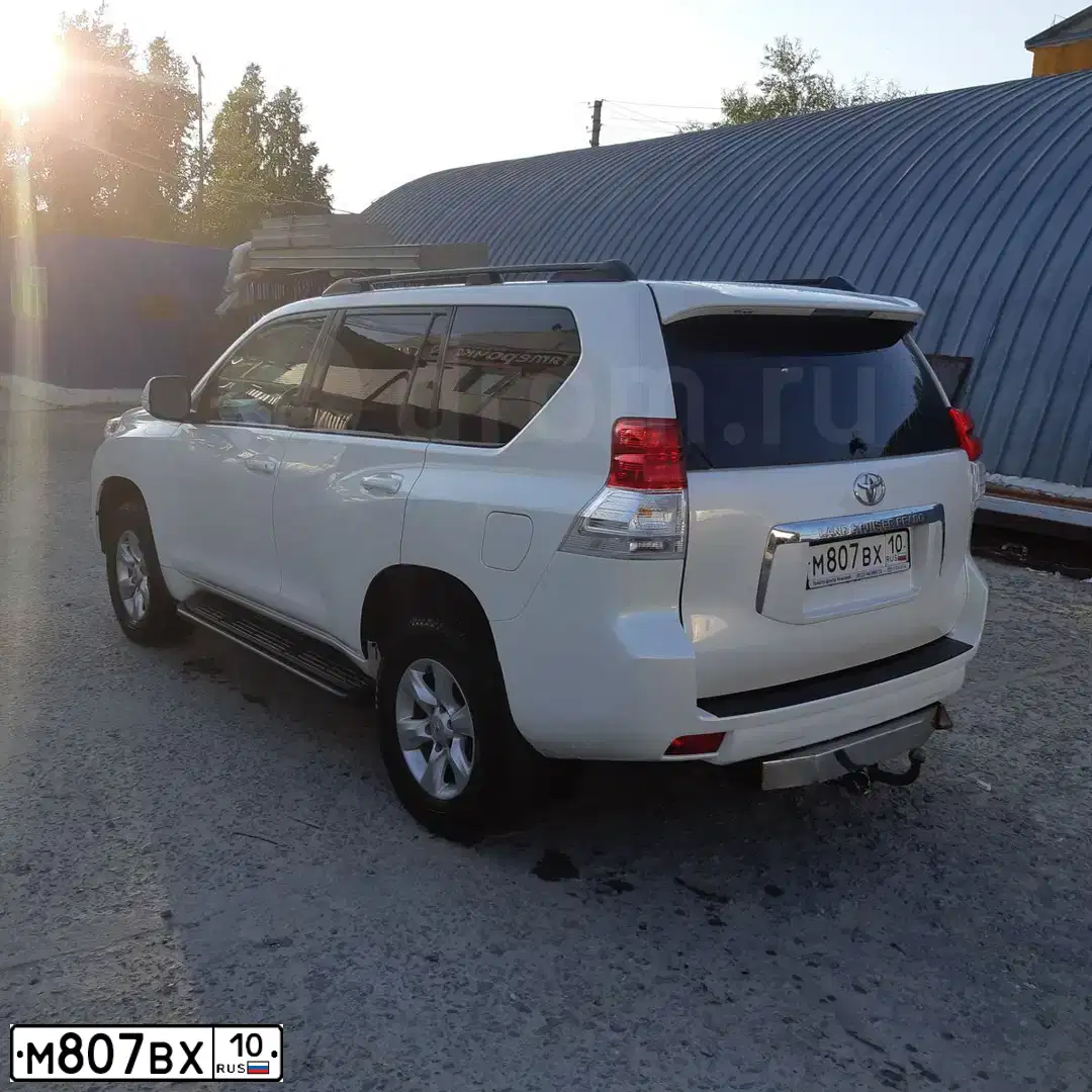 Фото автомобиля TOYOTA LANDCRUISER, 2013 — госномер В941КО186. Цвет: БЕЛЫЙ ПЕРЛАМУТР