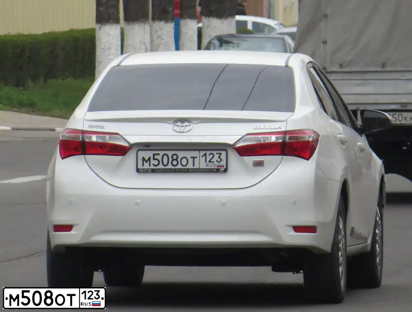 Фото автомобиля TOYOTA COROLLA, 2013 — госномер Е749КВ82. Цвет: БЕЛЫЙ