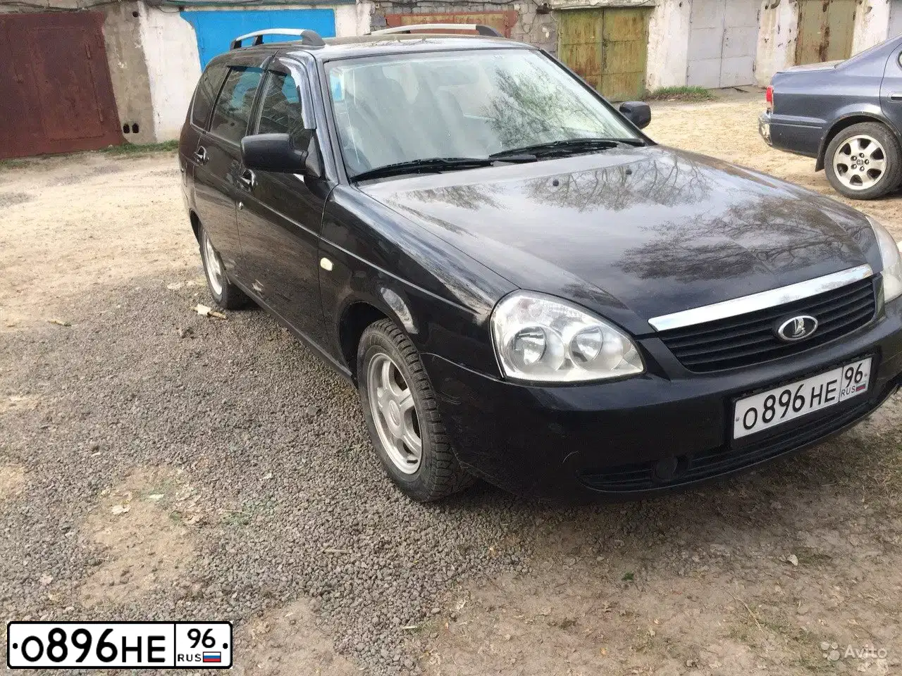 Фото автомобиля LADA 2171 PRIORA, 2009 — госномер О896НЕ96. Цвет: Сине-Черный