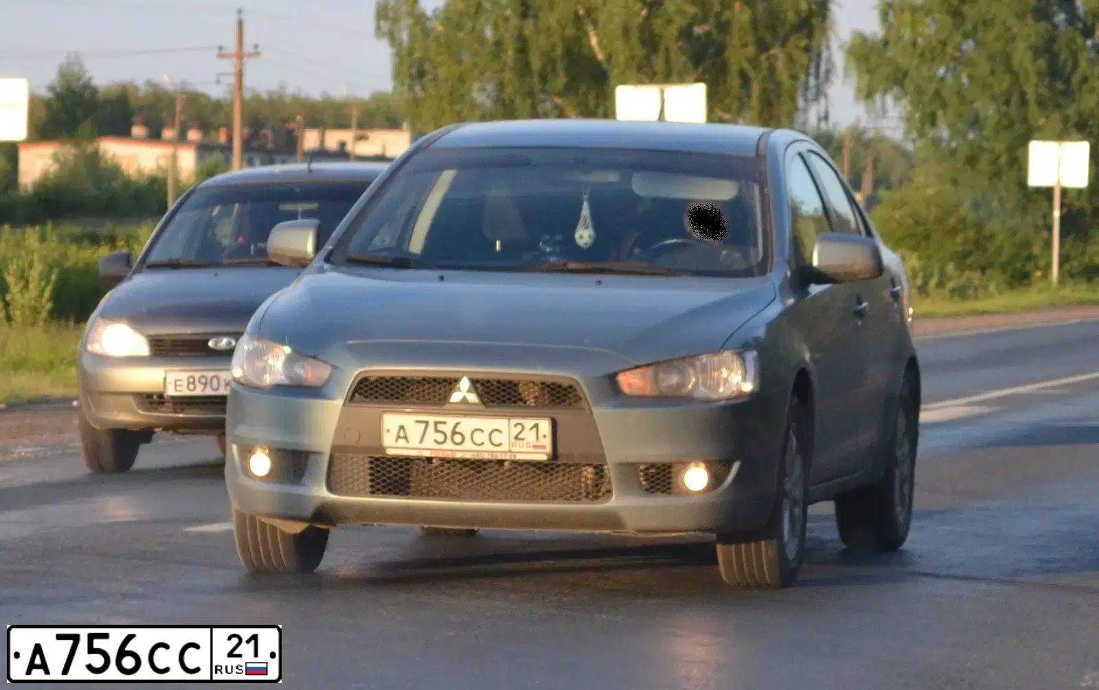 Фото автомобиля MITSUBISHI LANCER, 2010 — госномер К370УА21. Цвет: СВЕТЛО-СЕРО-ЗЕЛЕНЫЙ