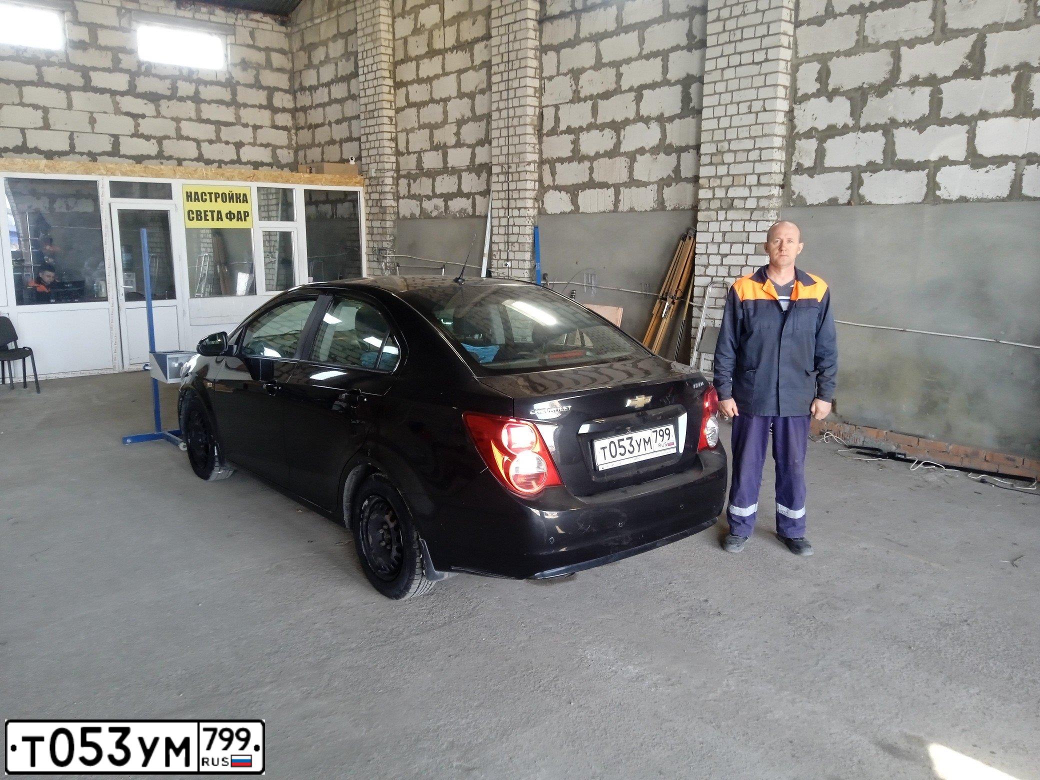 Фото автомобиля CHEVROLET AVEO, 2012 — госномер Т053УМ799. Цвет: ЧЕРНЫЙ