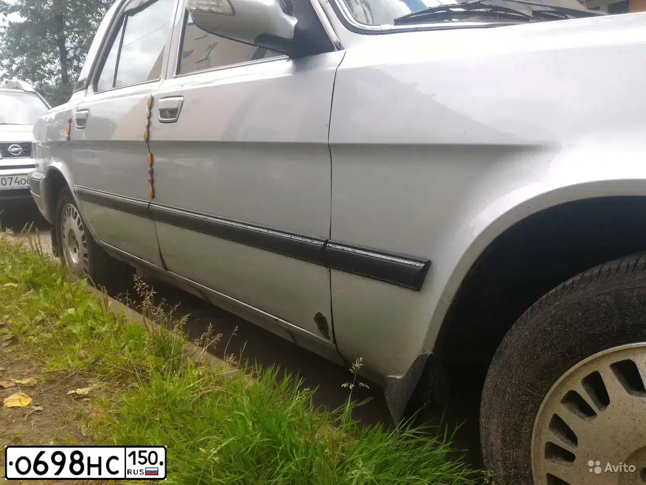 Фото автомобиля GAZ 3110 WOLGA, 2007 — госномер Е070СЕ750. Цвет: БУРАН