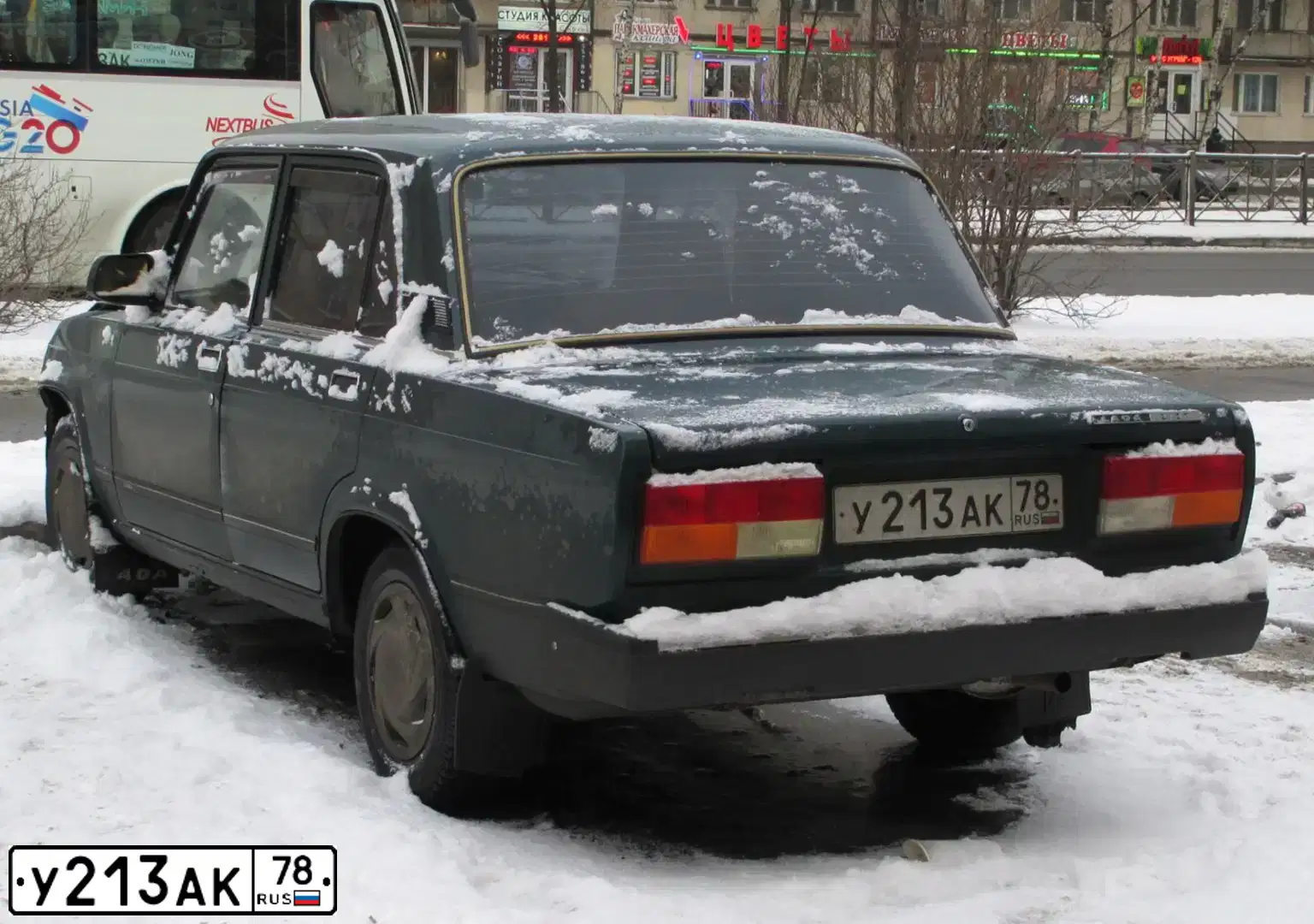 Фото автомобиля LADA 2107 LADA, 2007 — госномер Т505МК31. Цвет: Темно-зеленый