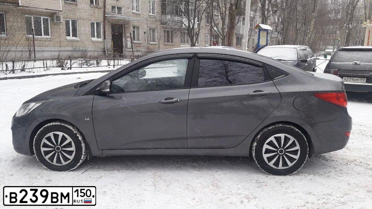 Фото автомобиля LADA 2111, 2006 — госномер В239ВМ150. Цвет: ЧЕРНЫЙ