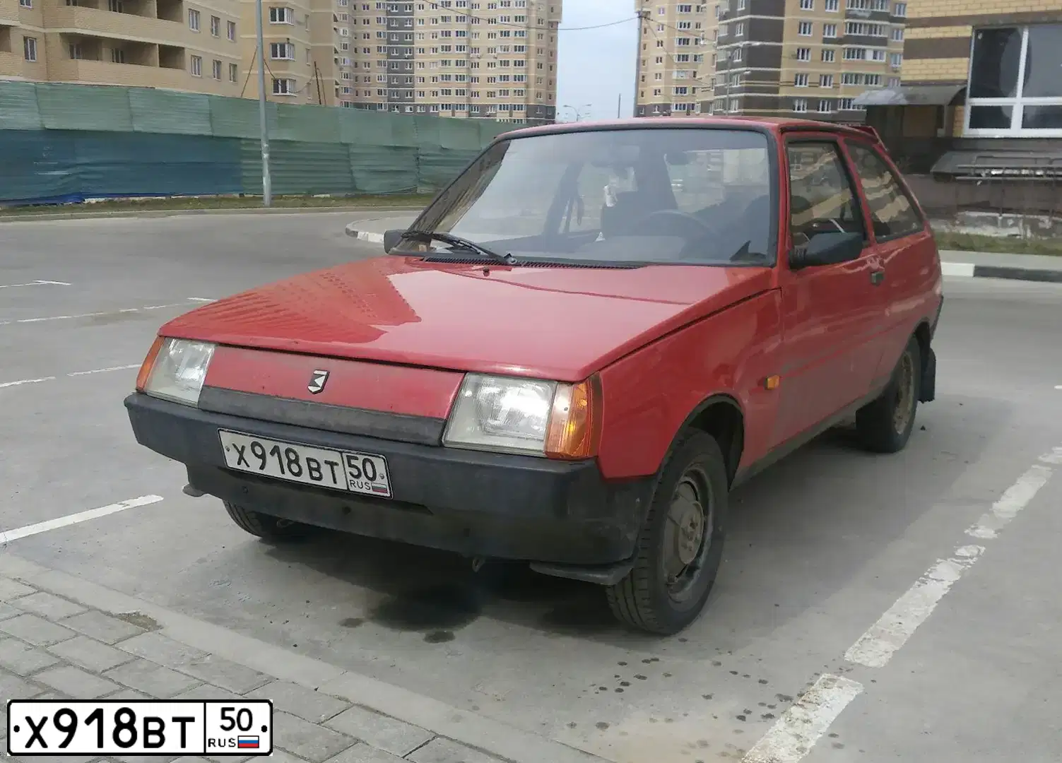 Фото автомобиля ZAZ -1102 TAVRIA, 1995 — госномер Х918ВТ50. Цвет: РУБИН
