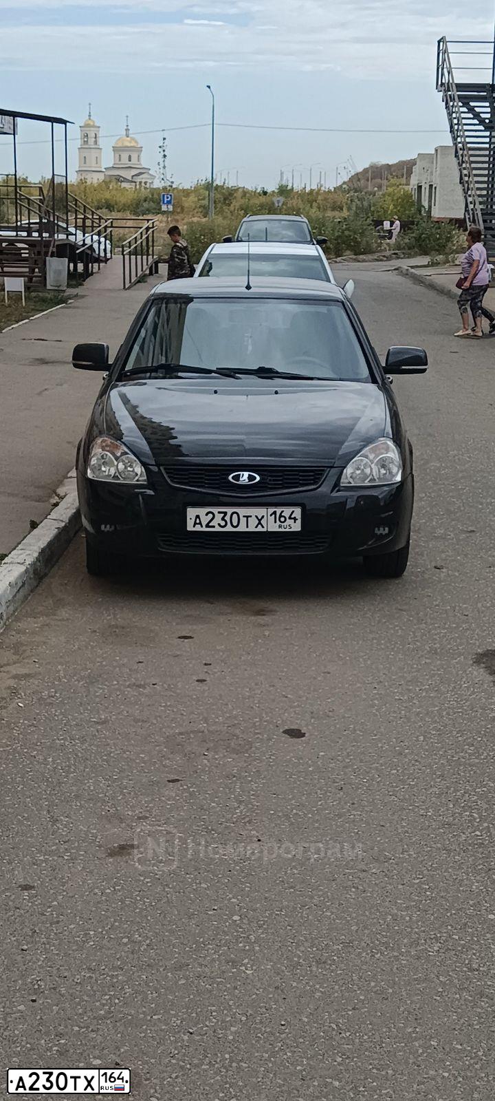 Фото автомобиля LADA 2170 PRIORA, 2010 — госномер Р673РР64. Цвет: Сине-Черный