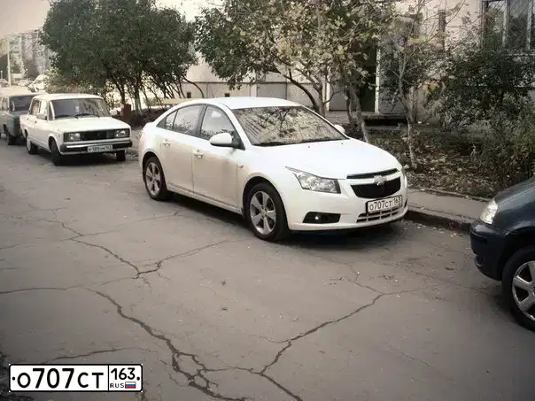 Фото автомобиля CHEVROLET CRUZE, 2011 — госномер О707СТ163. Цвет: Белый