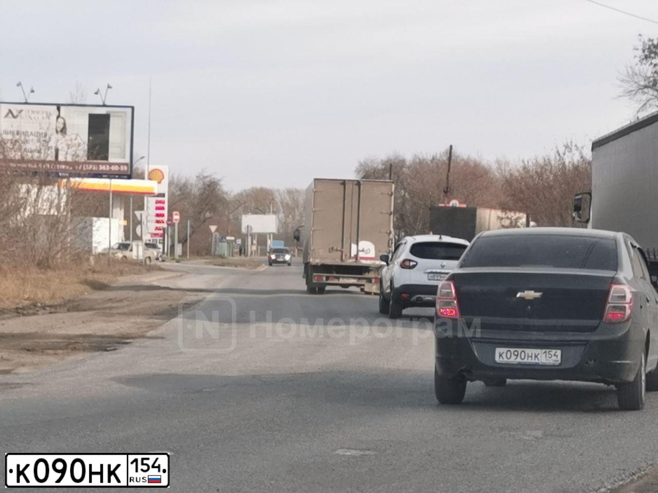 Фото автомобиля CHEVROLET COBALT, 2013 — госномер К090НК154. Цвет: ЧЕРНЫЙ