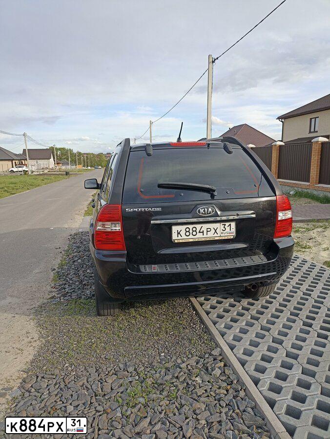Фото автомобиля KIA SPORTAGE, 2007 — госномер Р585КР68. Цвет: ЧЕРНЫЙ