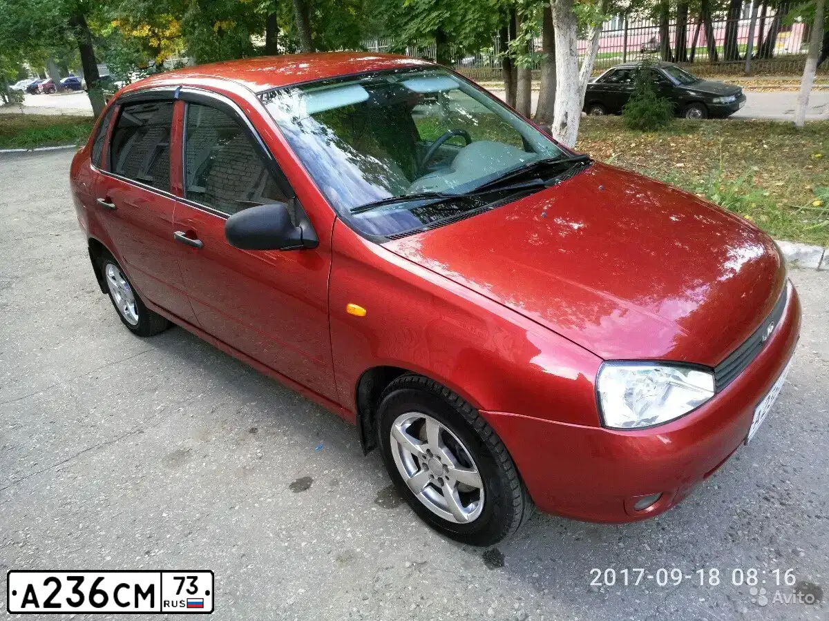 Фото автомобиля LADA 1118 KALINA, 2009 — госномер О996ТН123. Цвет: СЕРЕБРИСТО-КРАСНЫЙ