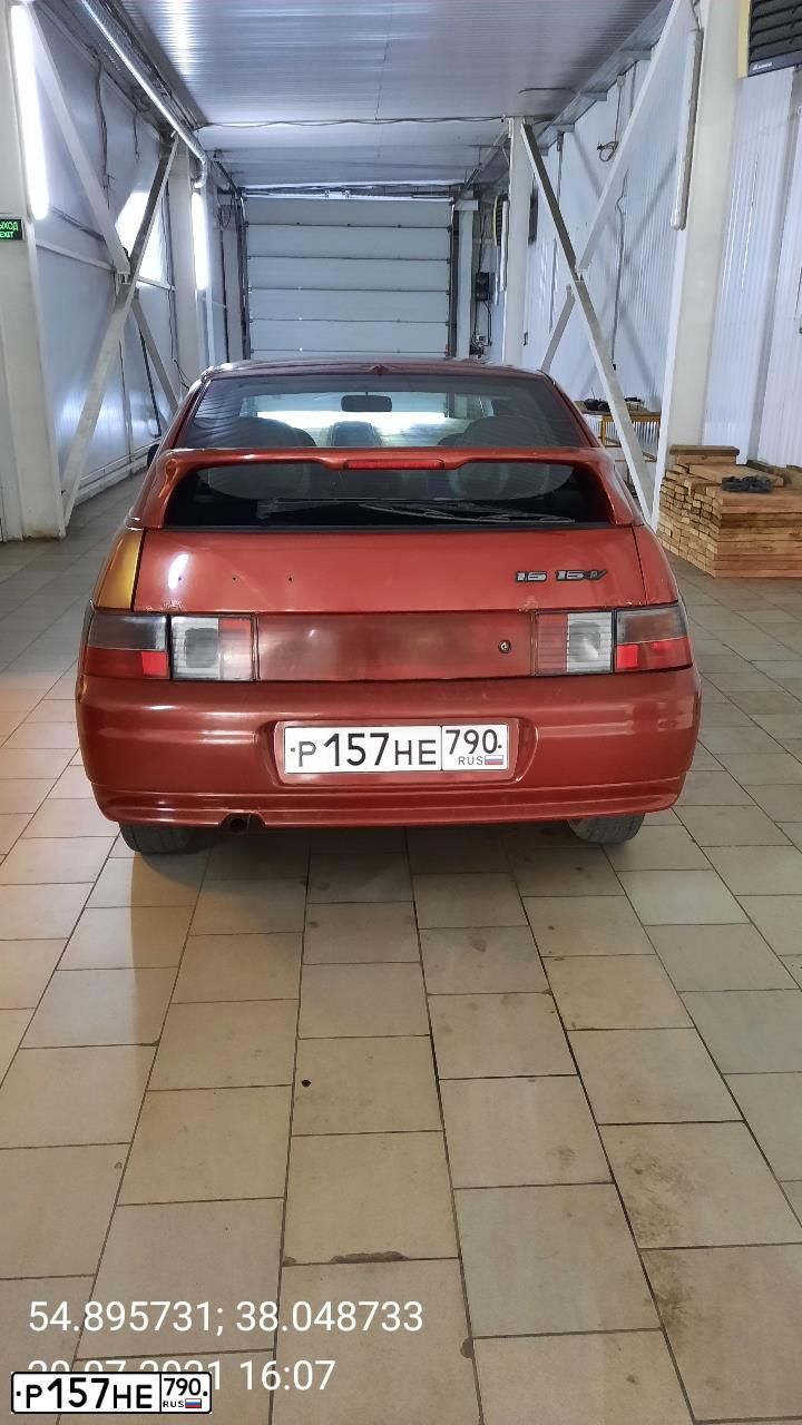 Фото автомобиля LADA 2112, 2007 — госномер В210СК13. Цвет: ЗОЛОТИСТО-КРАСНЫЙ