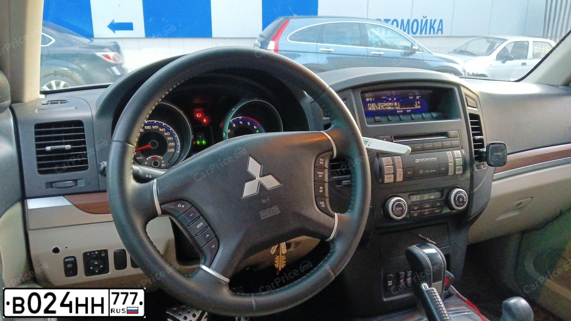 Фото автомобиля MITSUBISHI PAJERO, 2008 — госномер Р103ВО40. Цвет: ЧЕРНЫЙ