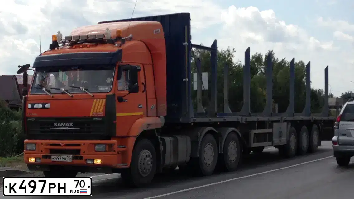 Фото автомобиля KAMAZ 6460 /6X4/, 2008 — госномер К497РН70. Цвет: ОРАНЖЕВЫЙ