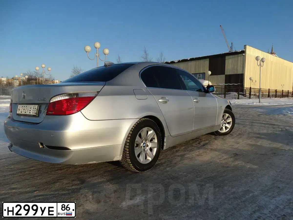 Фото автомобиля KIA RIO, 2010 — госномер Н299УЕ86. Цвет: Красный