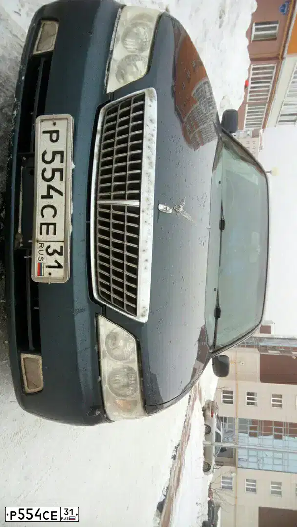 Фото автомобиля LADA 2107, 2005 — госномер Е277КУ138. Цвет: БЕЛЫЙ
