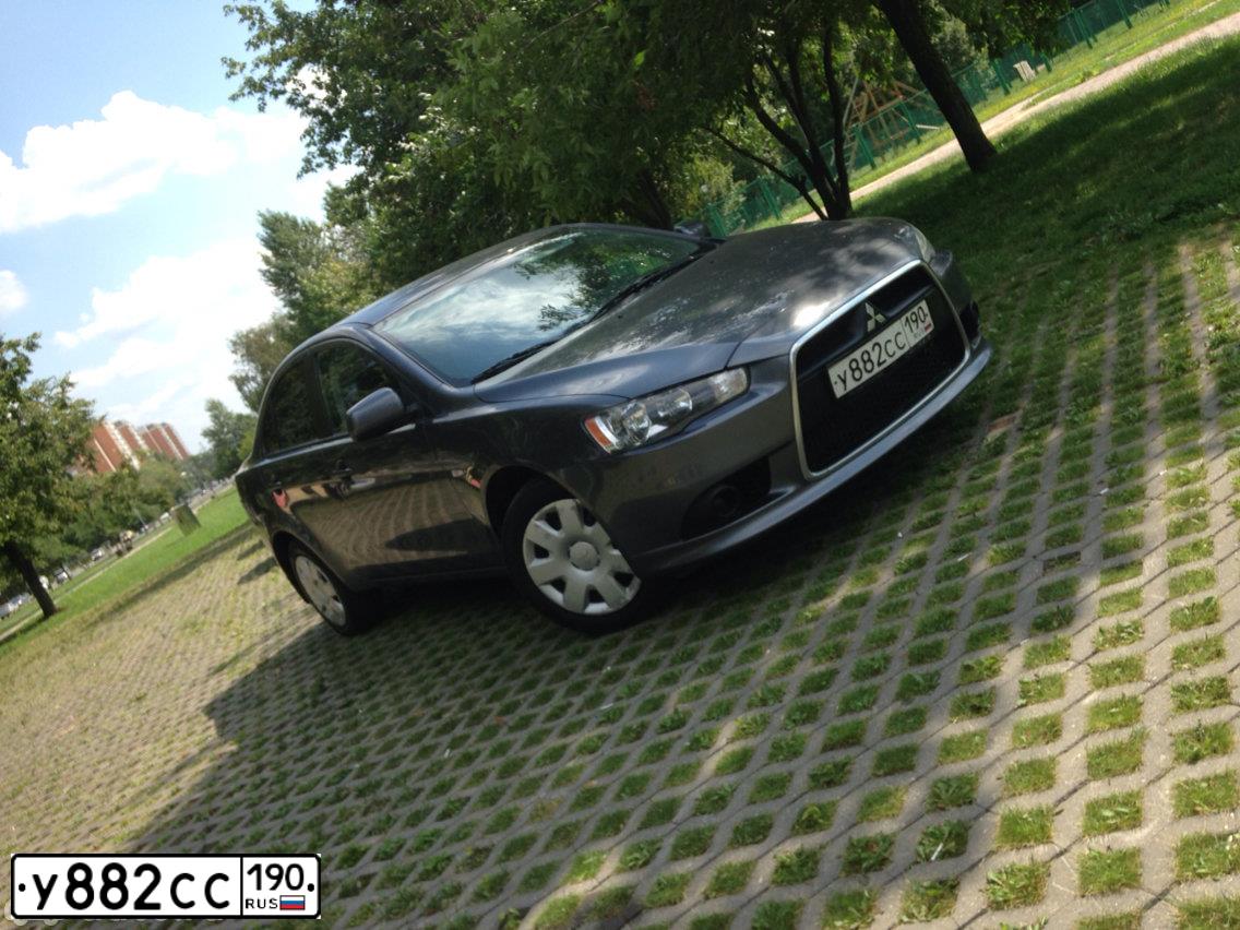 Фото автомобиля MITSUBISHI LANCER, 2011 — госномер Х025МН55. Цвет: СЕРЫЙ