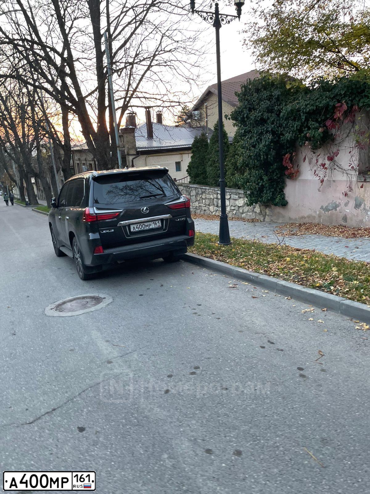 Фото автомобиля TOYOTA RAV4, 2006 — госномер С001НТ61. Цвет: КРАСНЫЙ