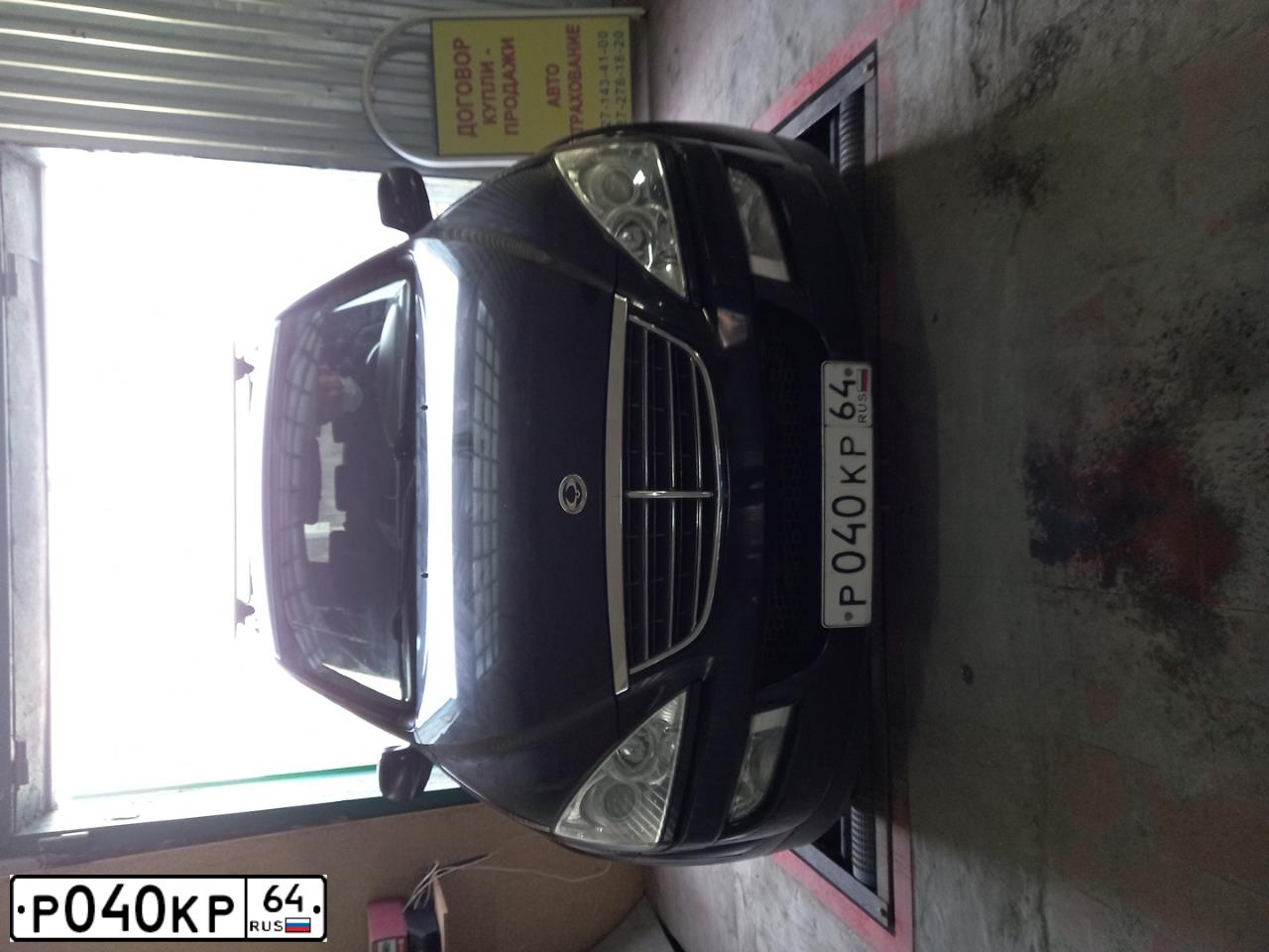 Фото автомобиля SSANGYONG KYRON, 2008 — госномер Р040КР64. Цвет: ЧЕРНЫЙ