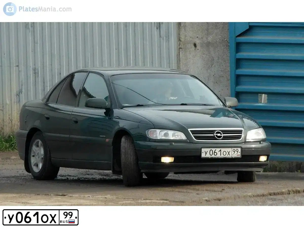 Фото автомобиля OPEL OMEGA, 2000 — госномер Н447АВ250. Цвет: Темно-зеленый