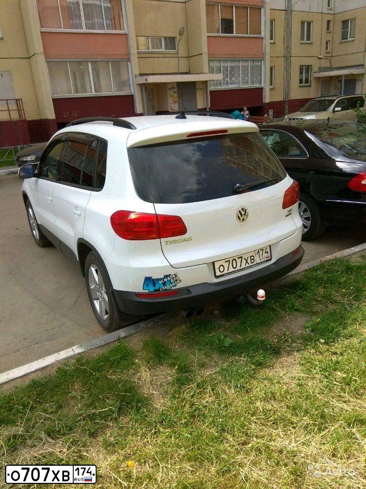 Фото автомобиля VOLKSWAGEN TIGUAN, 2014 — госномер Т749СР196. Цвет: БЕЛЫЙ