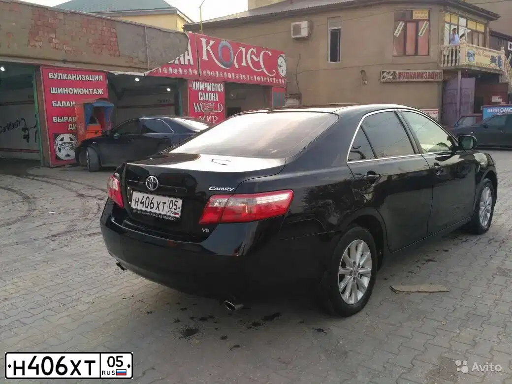 Фото автомобиля TOYOTA CAMRY, 2007 — госномер Н406ХТ05. Цвет: ЧЕРНЫЙ
