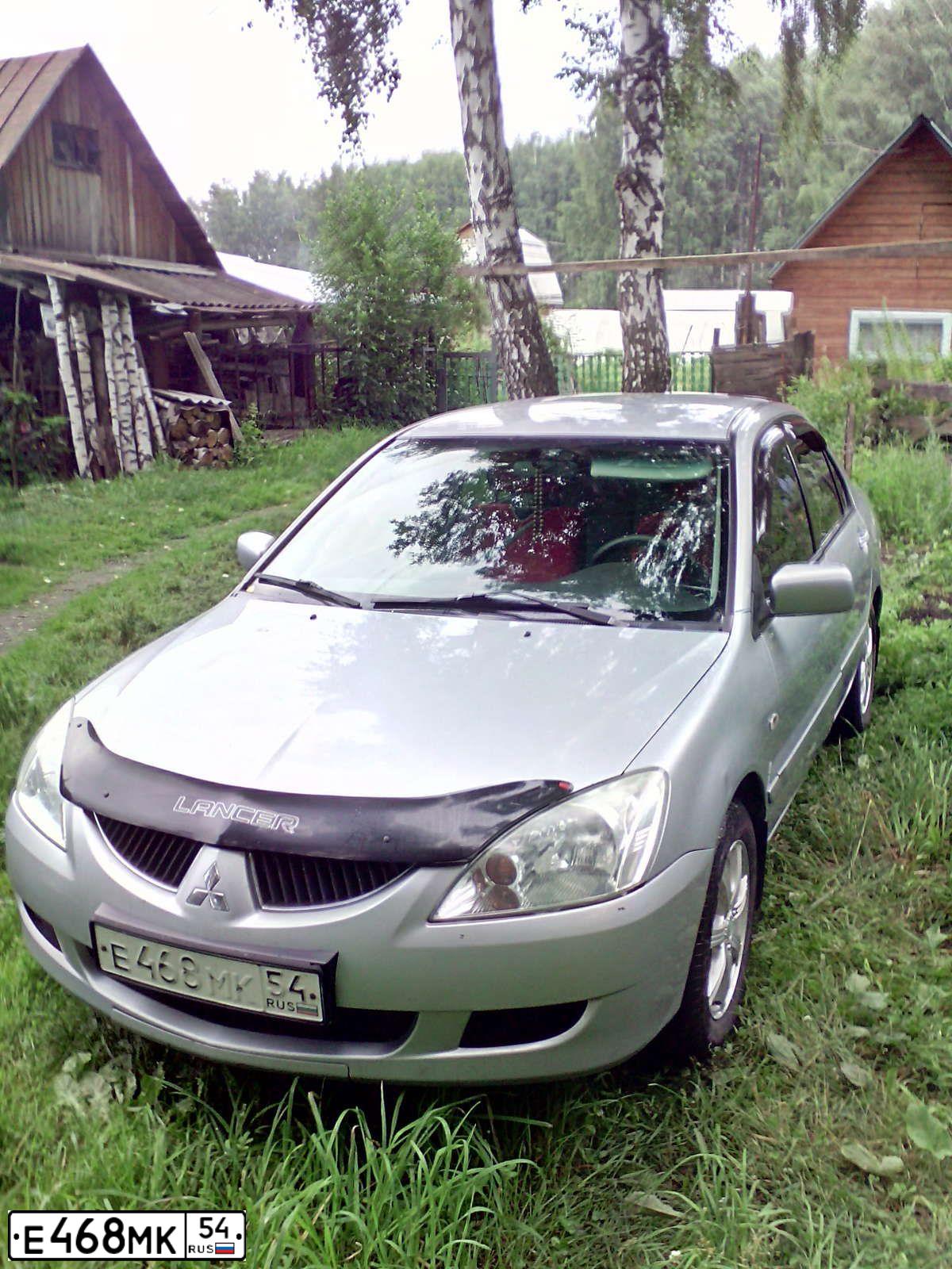Фото автомобиля MITSUBISHI LANCER, 2005 — госномер М966ХР154. Цвет: СЕРЕБРИСТЫЙ