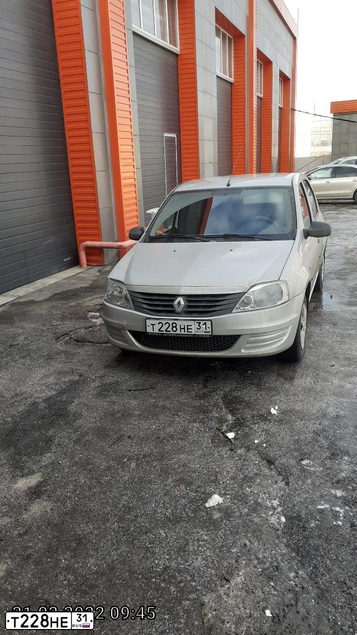 Фото автомобиля RENAULT LOGAN, 2012 — госномер Т228НЕ31. Цвет: СВЕТЛО-СЕРЫЙ