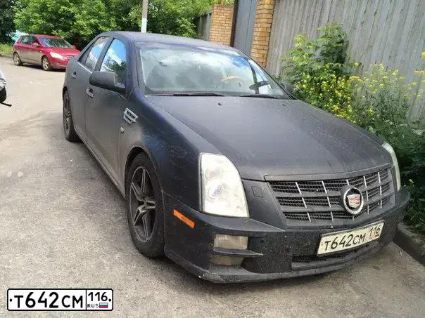 Фото автомобиля CADILLAC STS, 2008 — госномер К623ЕН761. Цвет: ЧЕРНЫЙ