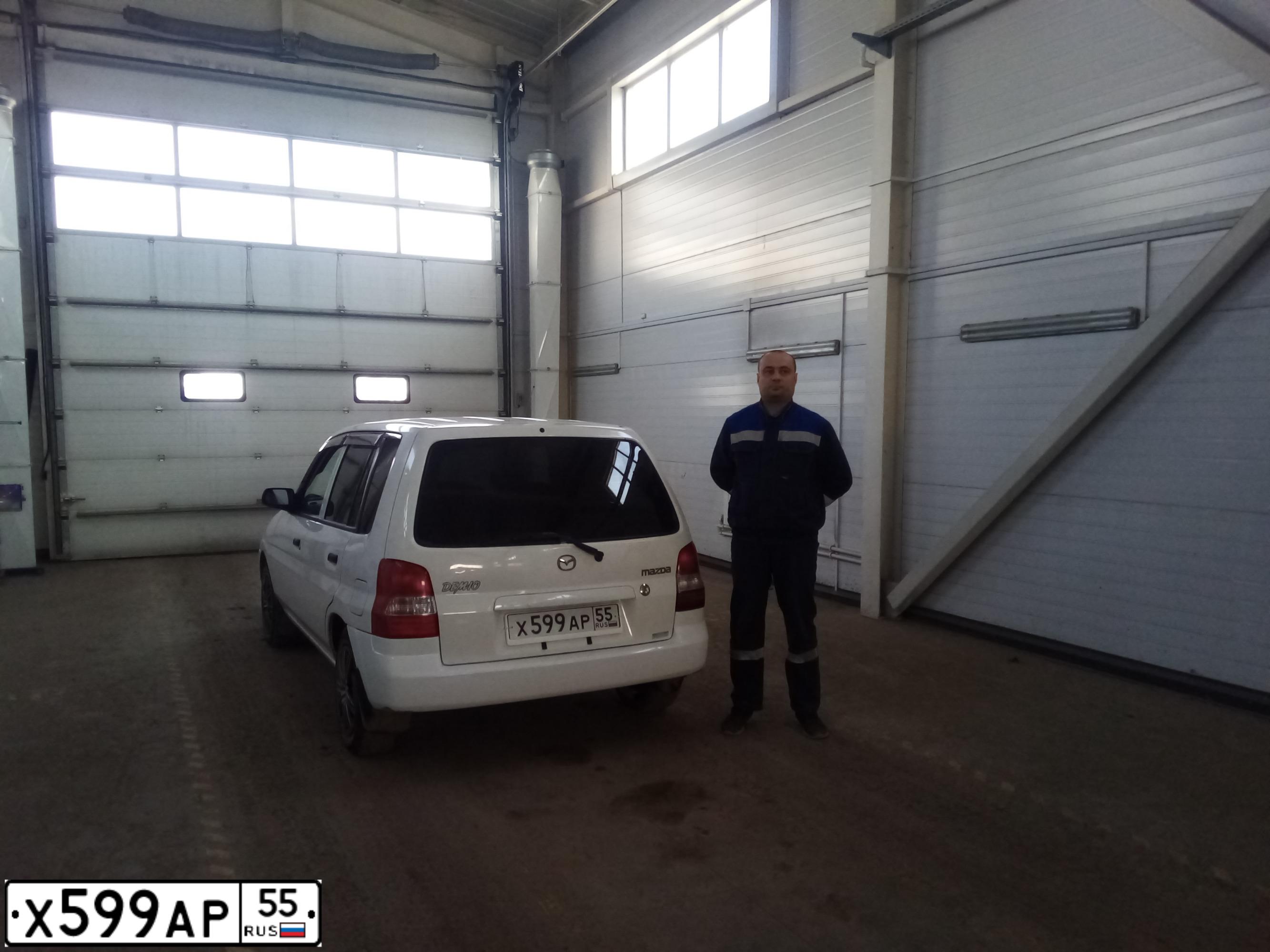 Фото автомобиля MAZDA DEMIO, 2002 — госномер Х599АР55