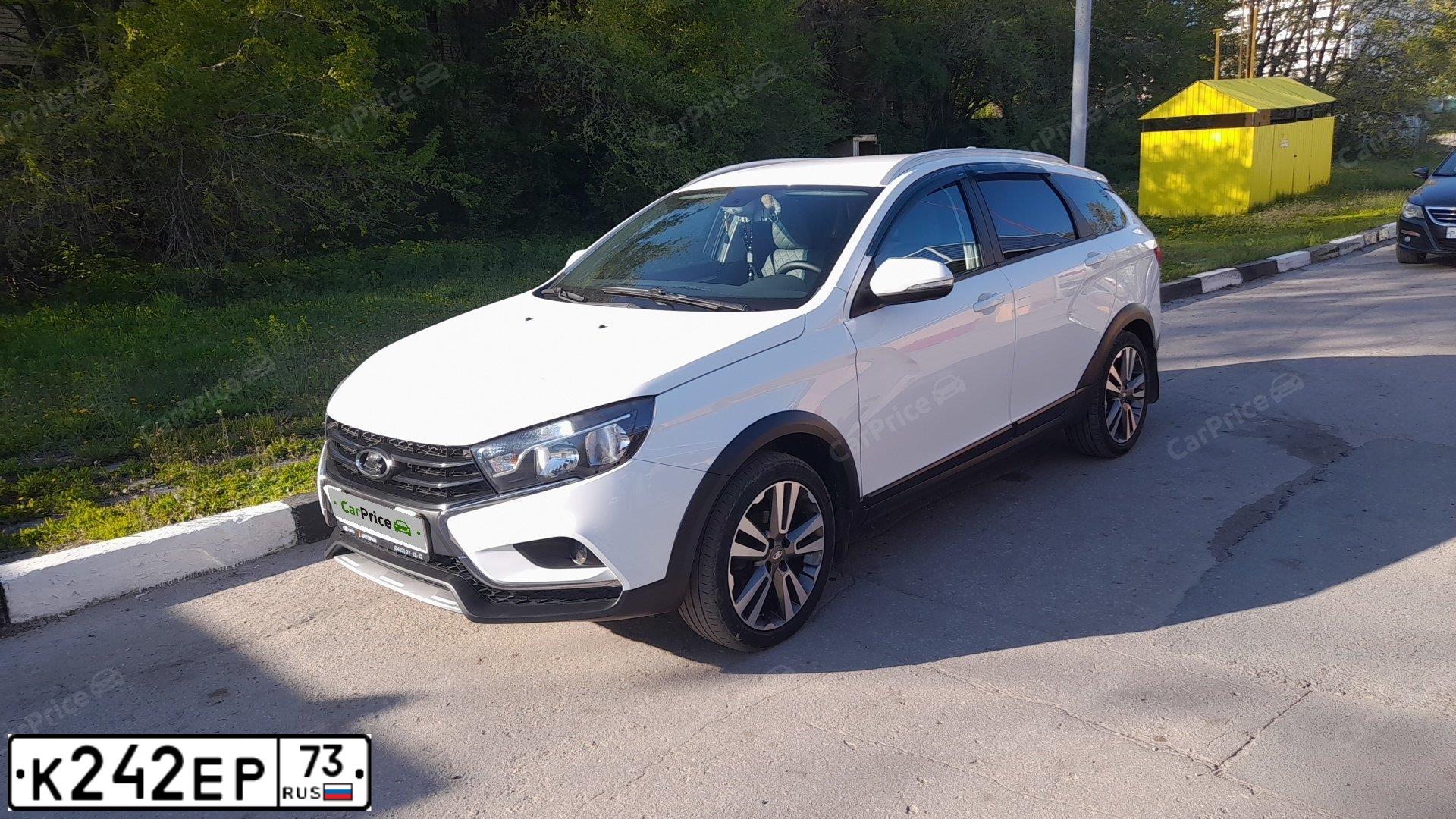Фото автомобиля LADA VESTA, 2018 — госномер К242ЕР73. Цвет: БЕЛЫЙ