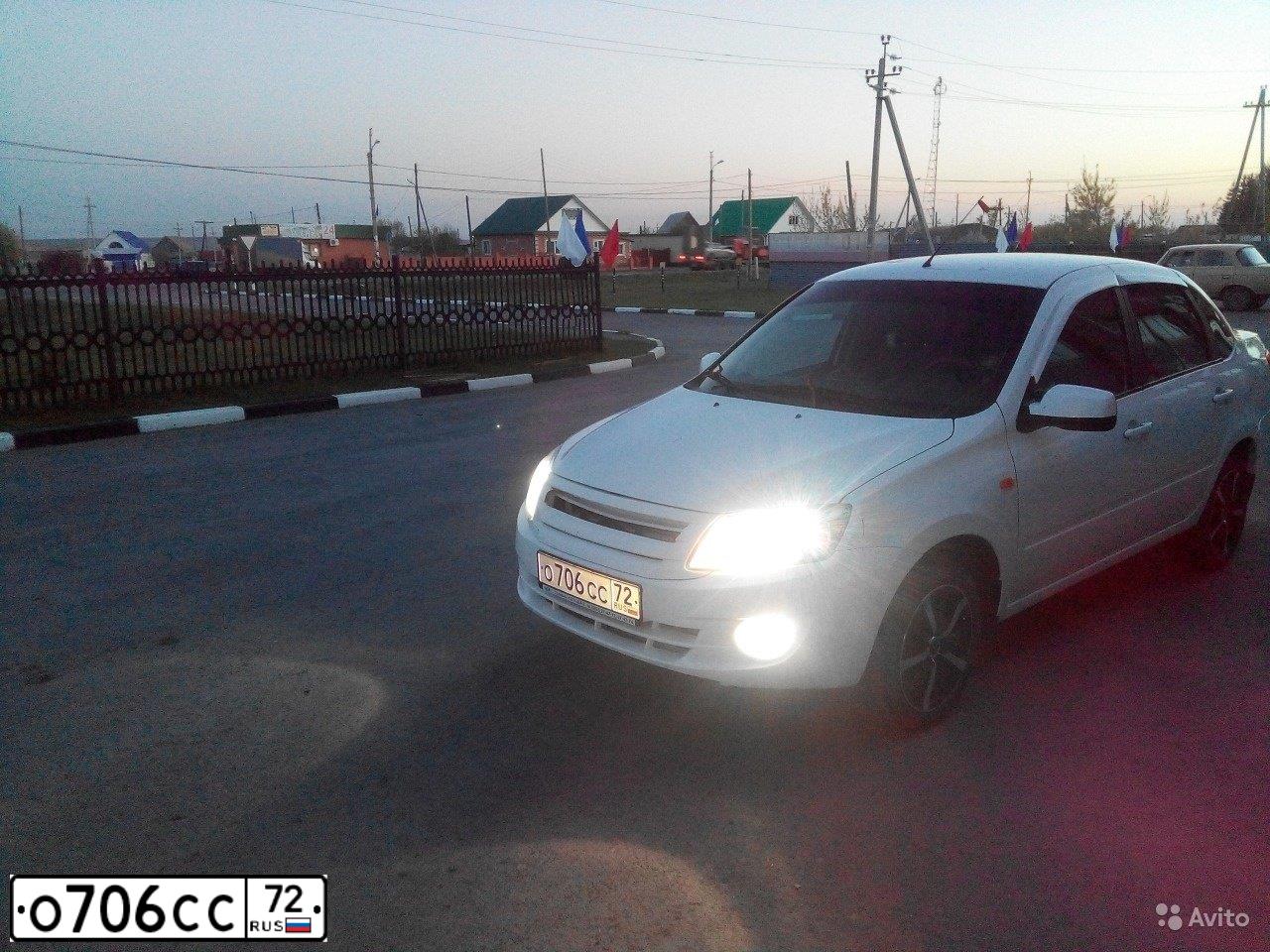 Фото автомобиля LADA 2190 GRANTA, 2013 — госномер В055РУ55. Цвет: БЕЛЫЙ