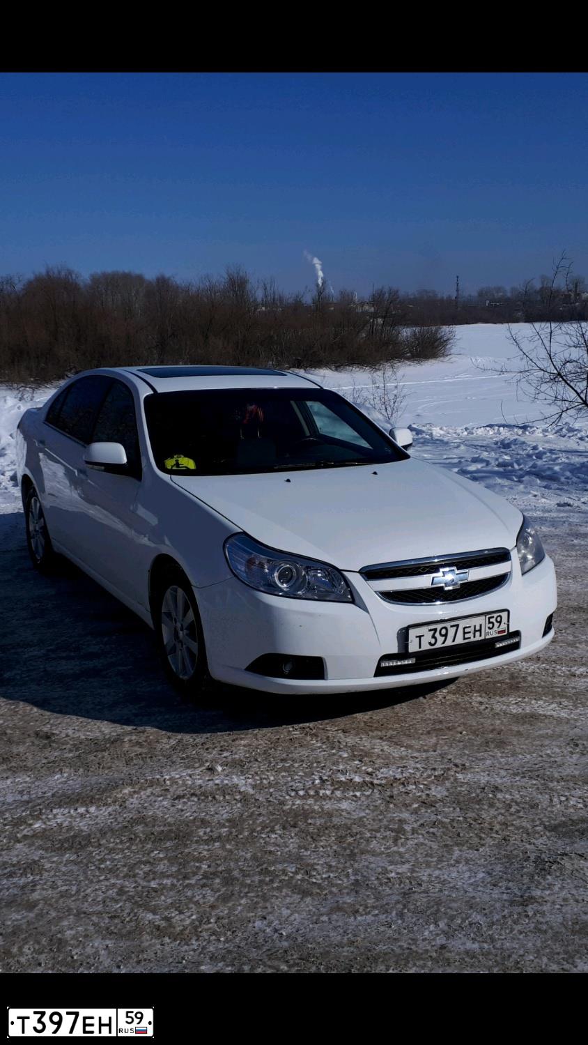 Фото автомобиля CHEVROLET EPICA, 2010 — госномер Н041АР774. Цвет: Белый
