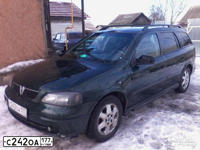 Фото автомобиля OPEL ASTRA, 1998 — госномер С242ОА177. Цвет: ЗЕЛЕНЫЙ