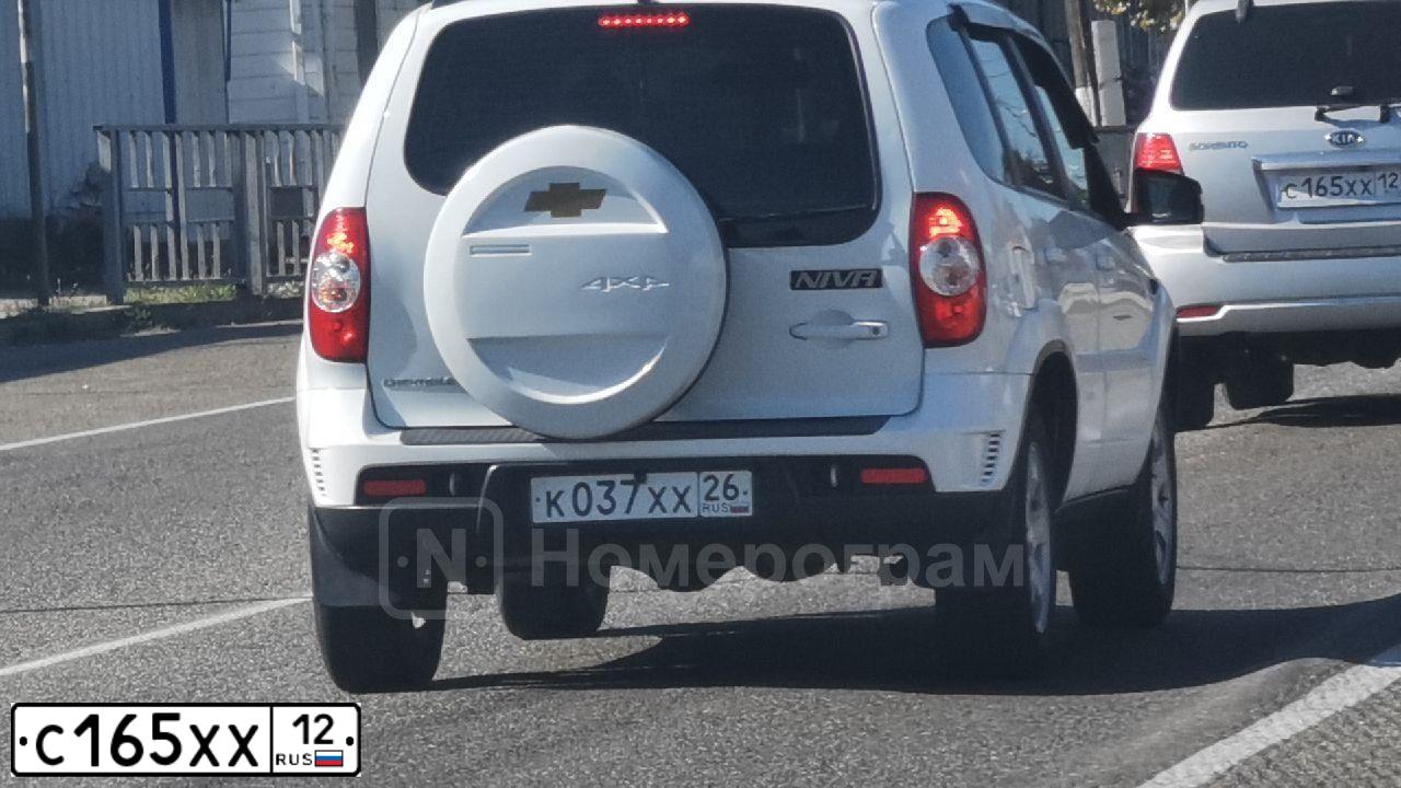Фото автомобиля RENAULT LOGAN, 2018 — госномер К899ОВ21. Цвет: Белый