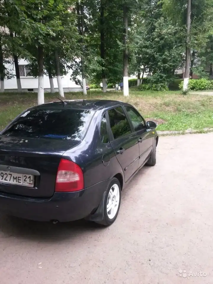 Фото автомобиля LADA 1118 KALINA, 2007 — госномер Е036УР21. Цвет: ФИОЛЕТОВЫЙ