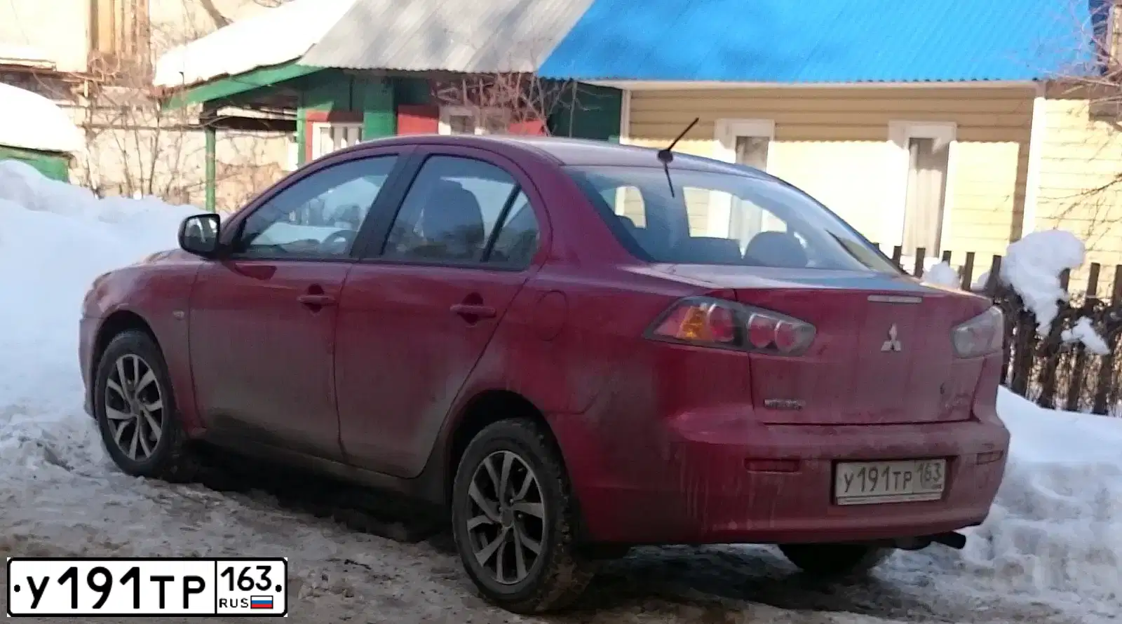 Фото автомобиля MITSUBISHI LANCER, 2014 — госномер У191ТР163. Цвет: КРАСНЫЙ