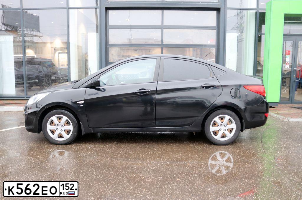 Фото автомобиля HYUNDAI SOLARIS, 2012 — госномер К562ЕО152. Цвет: ЧЕРНЫЙ