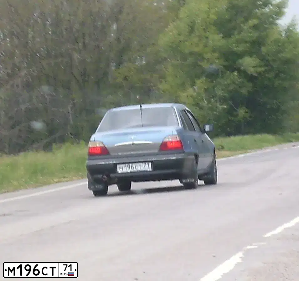 Фото автомобиля DAEWOO NEXIA, 2006 — госномер М196СТ71. Цвет: ВАСИЛЕК