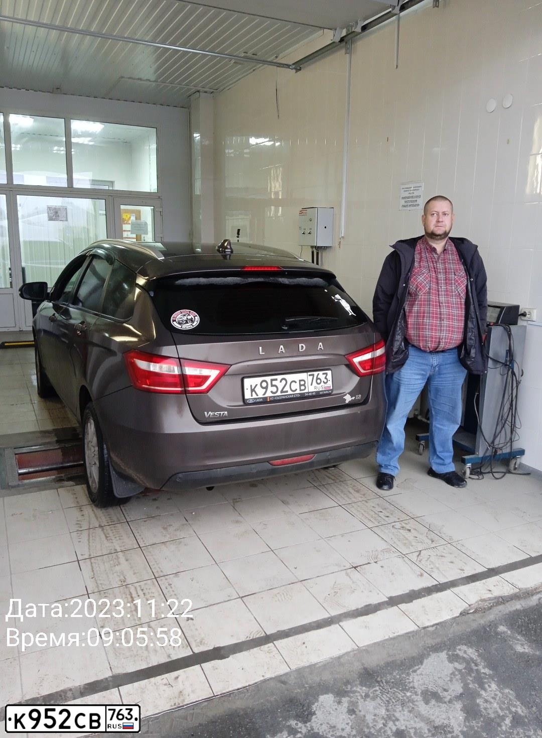 Фото автомобиля LADA VESTA, 2018 — госномер Н210МУ82. Цвет: Коричневый