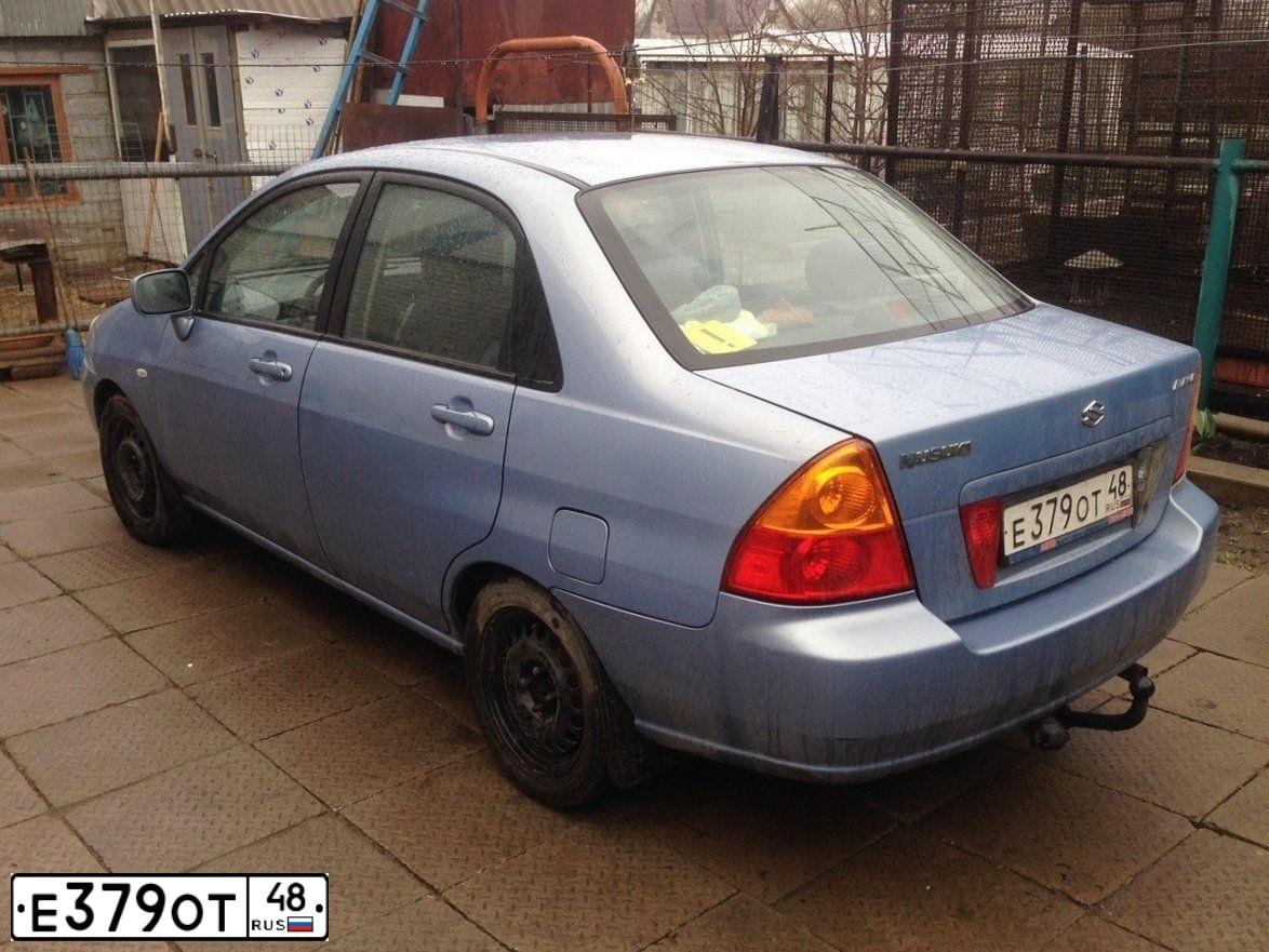 Фото автомобиля SUZUKI LIANA, 2003 — госномер У717ТУ48. Цвет: синий